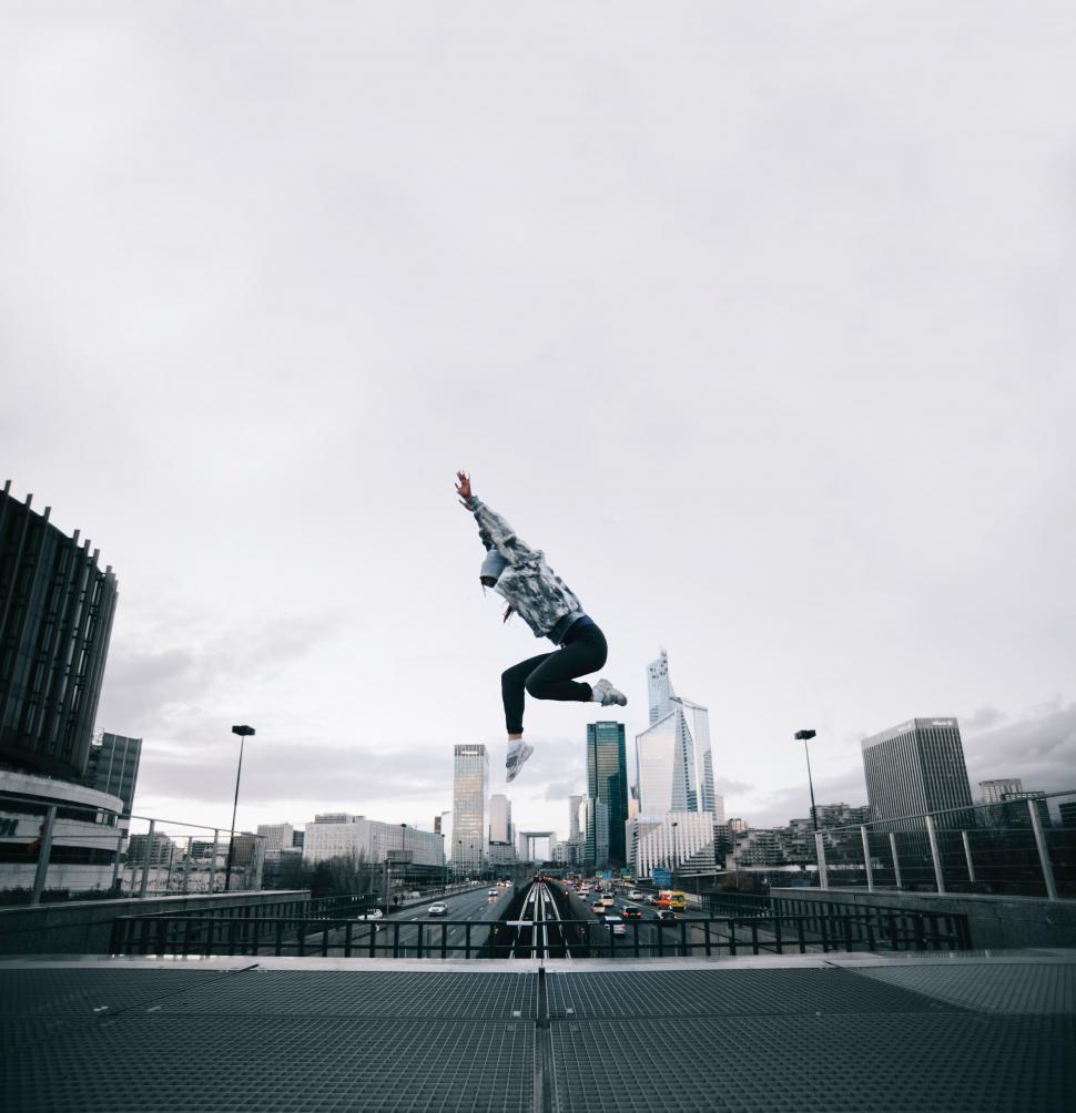 Free Image of Person Jumping on Skateboard in Air 