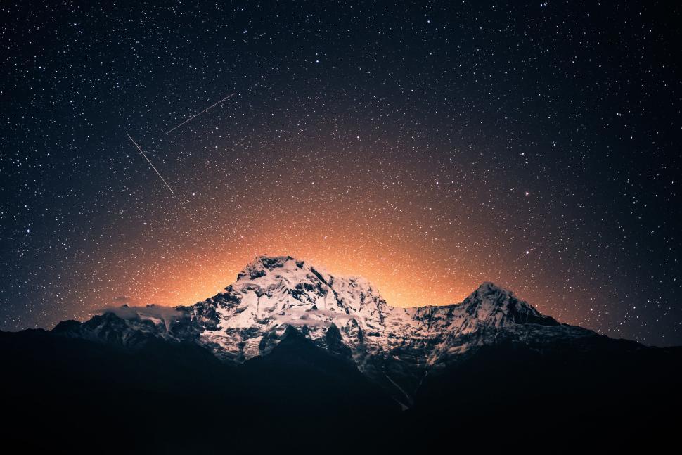 Free Image of Night Sky Over Mountain With Stars 