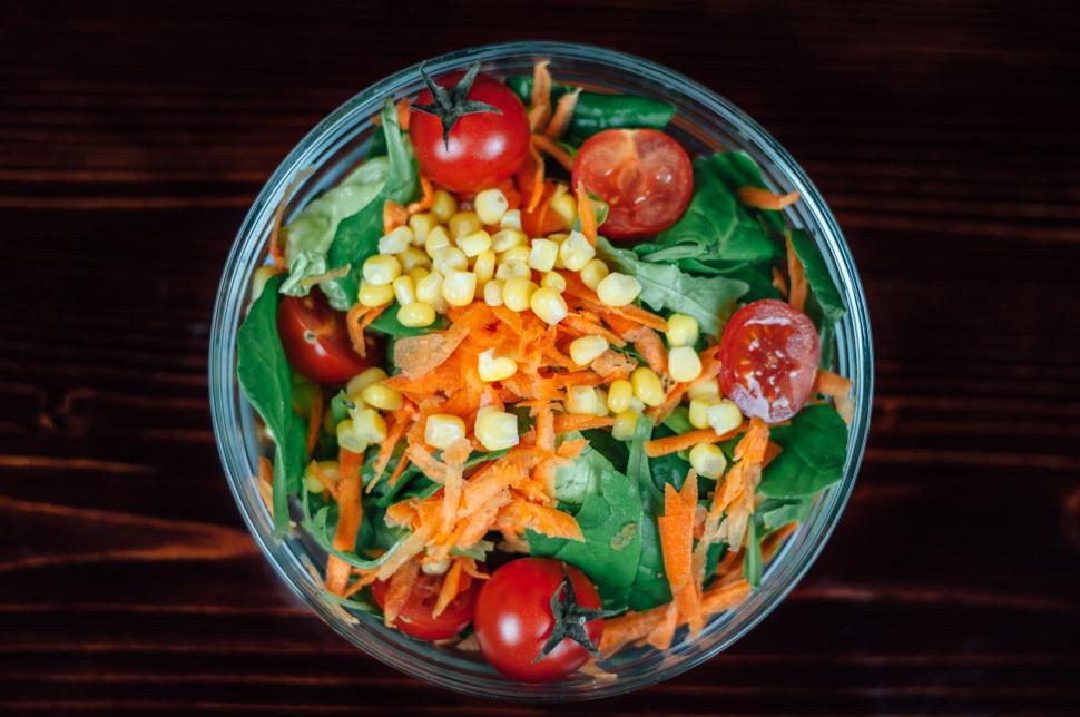 Free Image of Salad With Carrots, Corn, and Tomatoes in Glass Bowl 