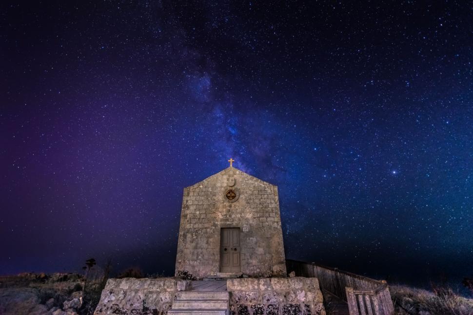 Free Image of Church With Stairs Under Night Sky Filled With Stars 
