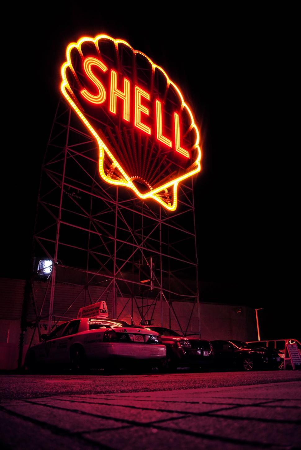 Free Image of Shell Gas Station Sign Illuminated at Night 