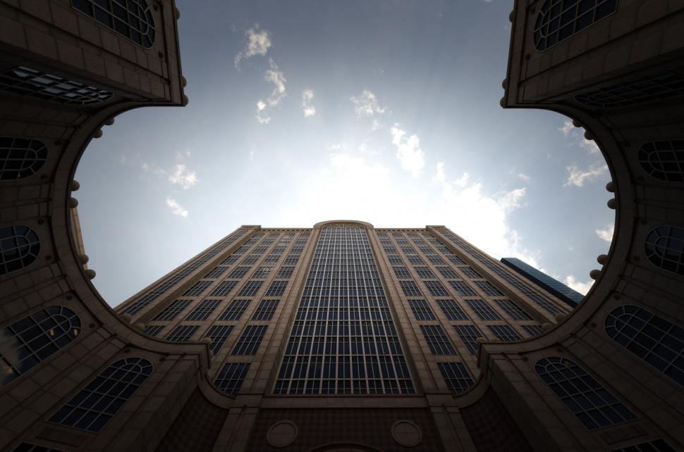 Free Image of Looking Up at a Tall Skyscraper 