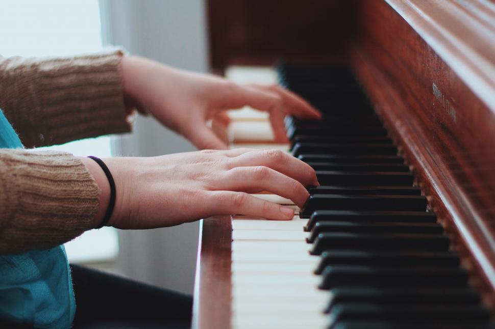 Free Image of Person Playing Piano With Hands 
