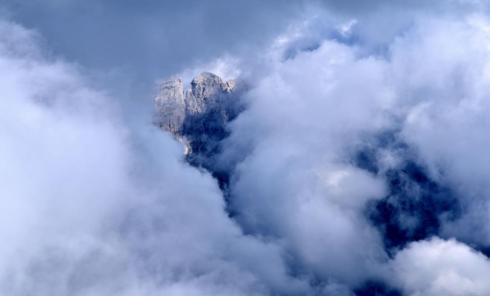Free Image of View of the Top of a Mountain in the Clouds 