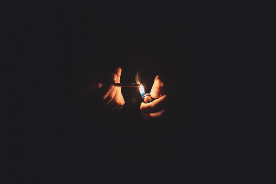 Free Image of Person Holding a Lighter 