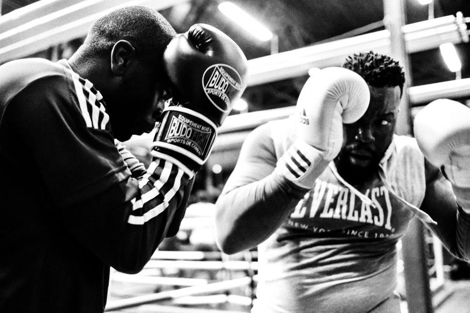 Free Image of Two Men Boxing in Black and White 