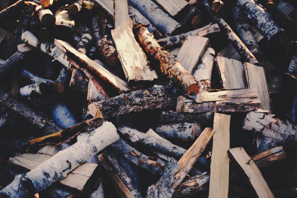 Free Image of Pile of Wood on Ground 
