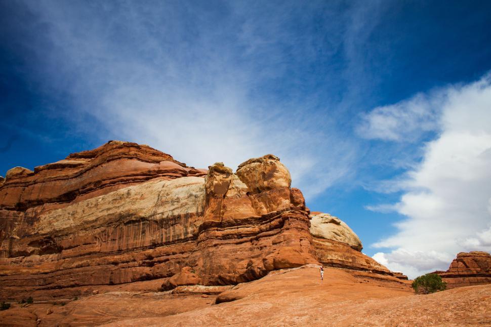 Free Image of Rocky Outcropping in Desert Under Blue Sky 