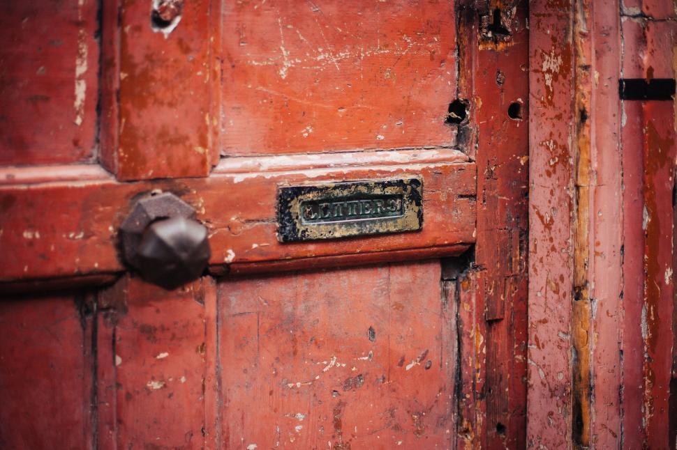 Free Image of Close Up of Red Door With Metal Handle 