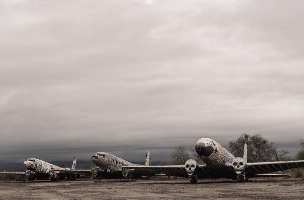 Free Image of Row of Airplanes on Tarmac 