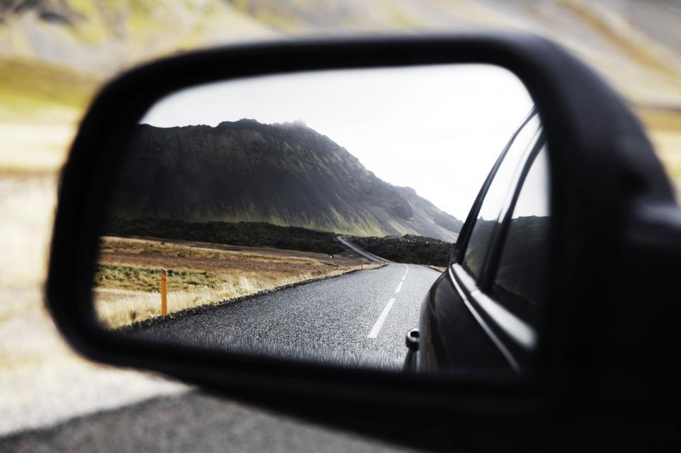 Free Image of Mountain Reflected in Car Side View Mirror 
