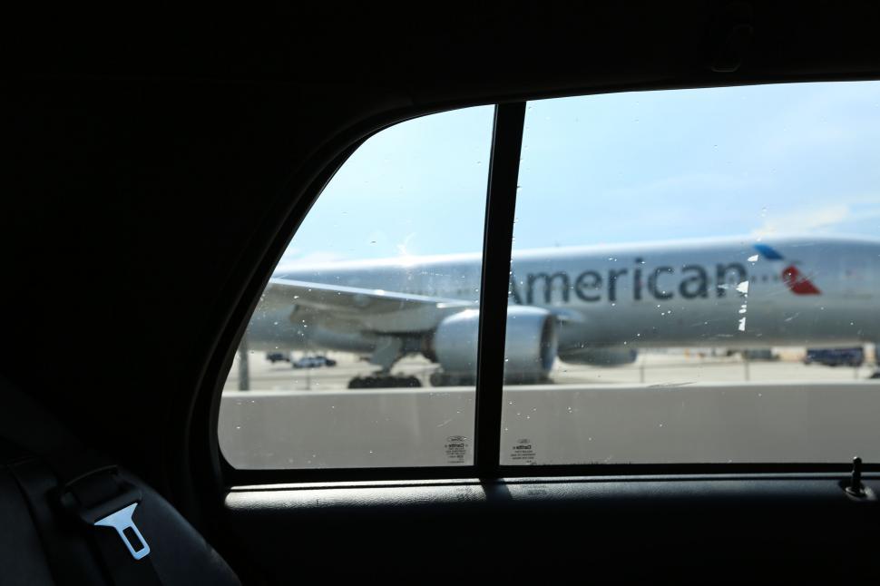 Free Image of Large Commercial Airplane Sitting on Runway 