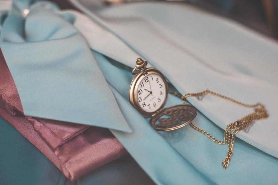 Free Image of Pocket Watch on Blue Tie 
