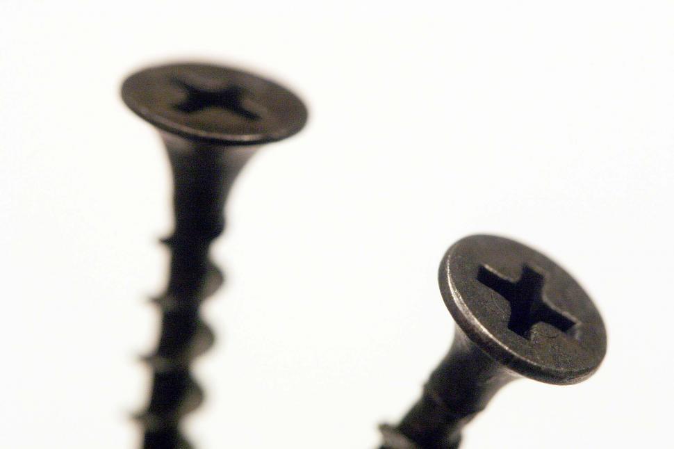 Free Image of Close Up of Two Screws 