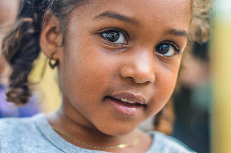 Free Image of Close Up of a Little Girl With Blue Eyes 