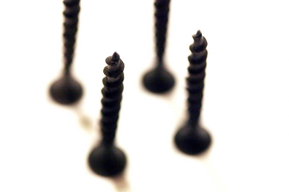 Free Image of Group of Screws Arranged Neatly 