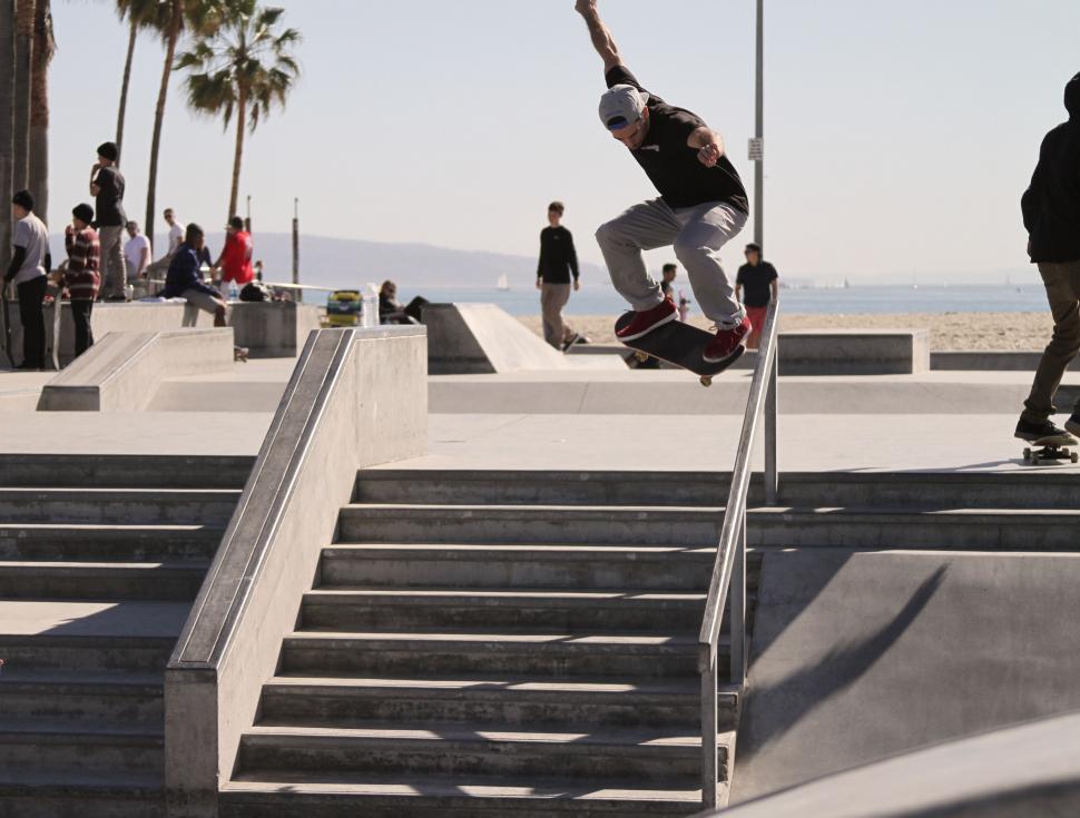 Free Image of Man Riding Skateboard Up Ramp 