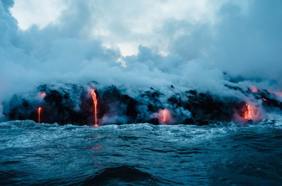 Free Image of Group of Lava Erupting From the Ocean 