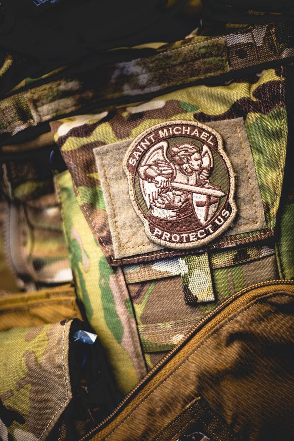 Free Image of Close Up of Camouflage Bag With Patch 