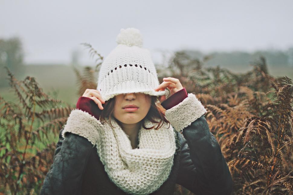 Free Image of Woman Wearing White Hat and Scarf 