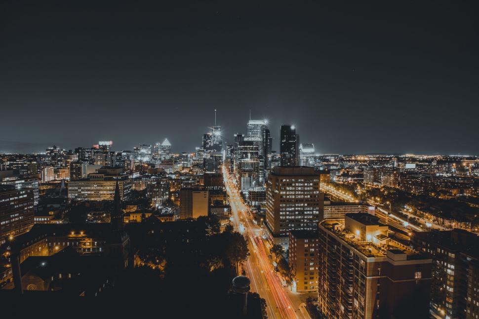 Free Image of A Night View of the City From a Rooftop 