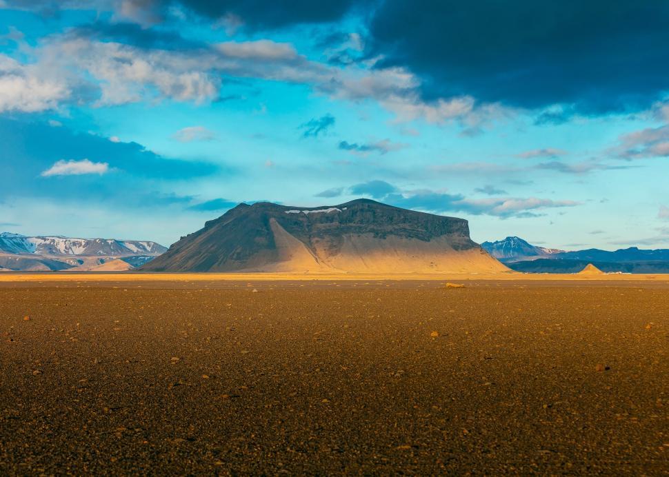 Free Image of Desert Landscape With Distant Mountain 
