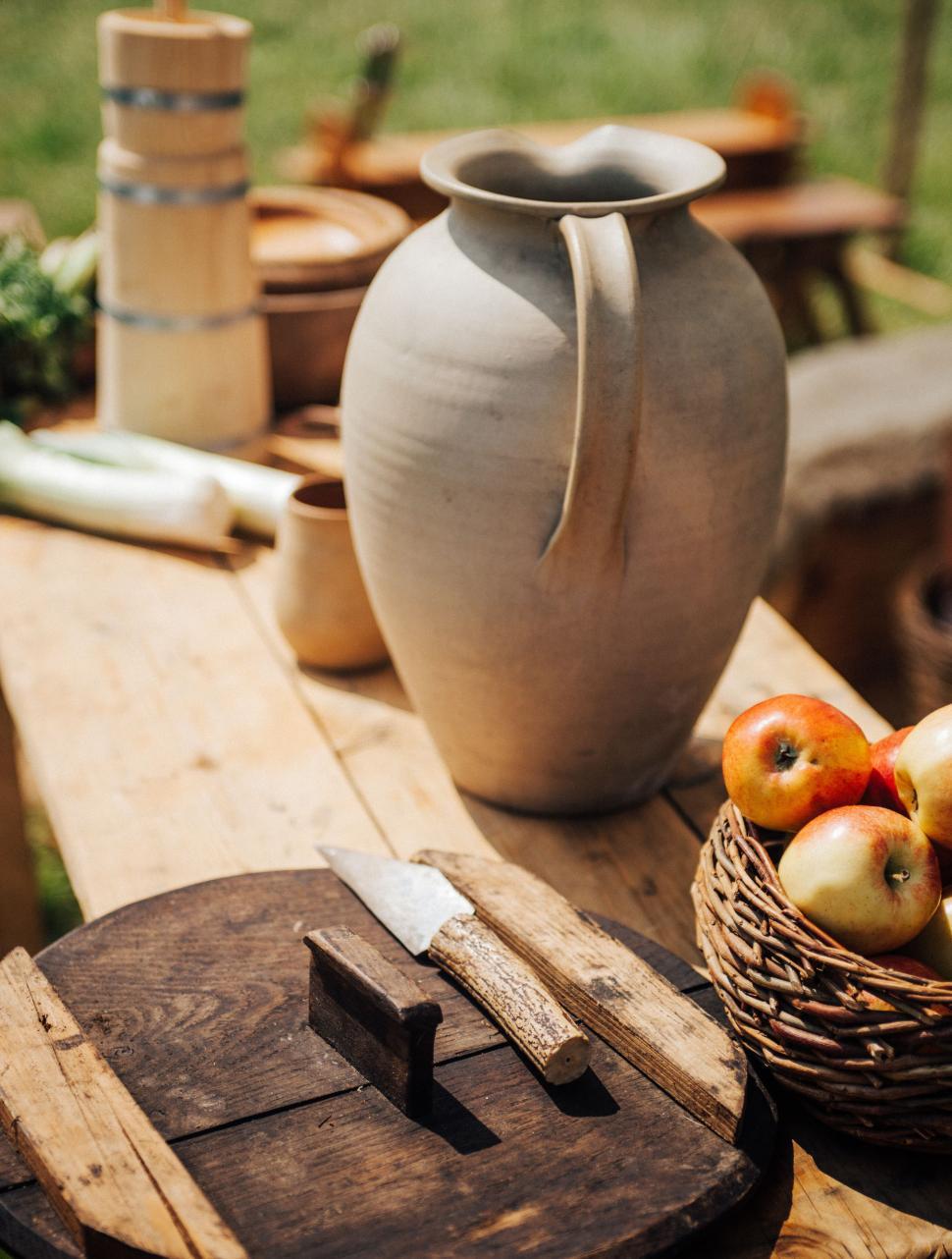Free Image of Wooden Table With Basket of Apples 