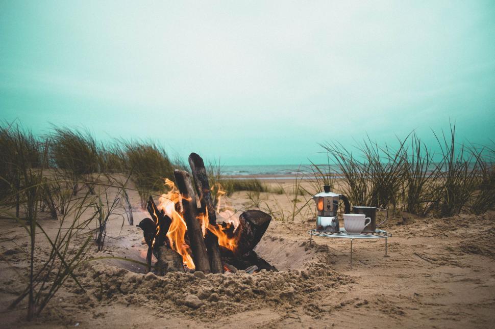 Free Image of Fire Pit on Sandy Beach 
