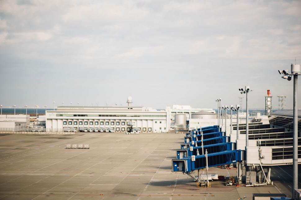 Free Image of Airplanes Parked on Airport Tarmac 