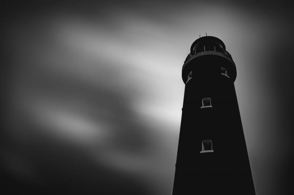 Free Image of Black and White Lighthouse Standing Tall 