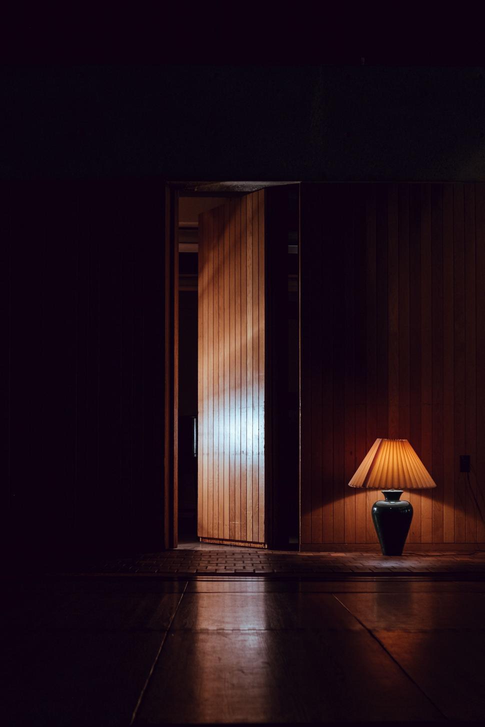 Free Image of Lamp on Table Next to Doorway 