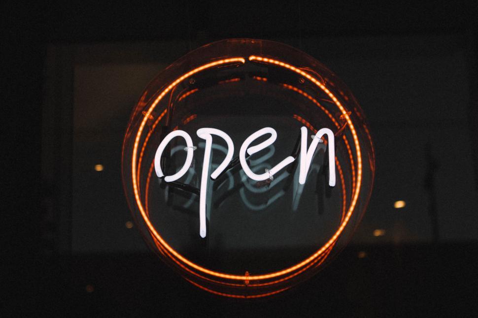 Free Image of Neon Sign With the Word Open 