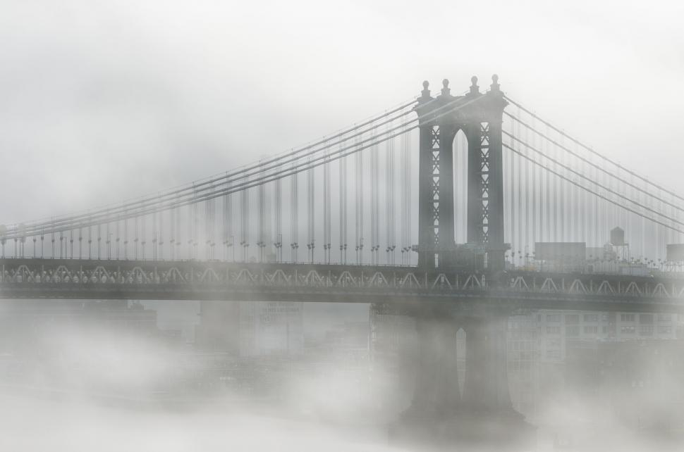 Free Image of Foggy Bridge Over River 