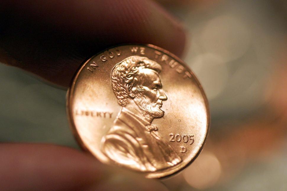 Free Image of Person Holding Coin Close Up 