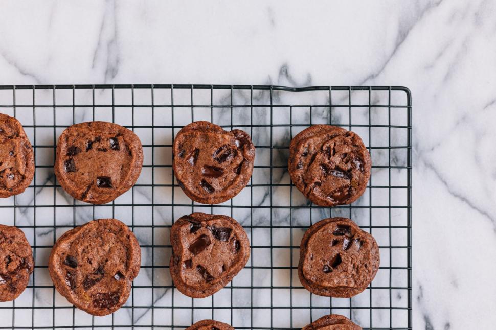 Free Image of Chocolate Chip Cookies Cooling on a Cooling Rack 