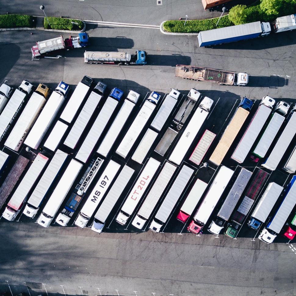 Free Image of Busy Parking Lot Filled With Trucks 
