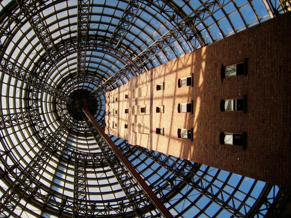 Free Image of Inside of a Building Looking Up at the Sky 