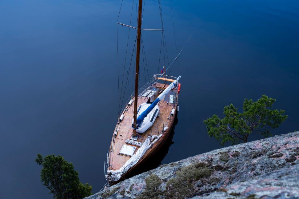 Free Image of Boat Docked at Cliff Edge 