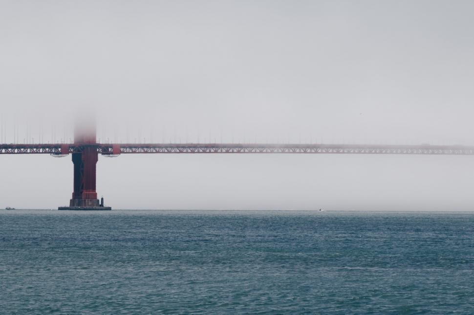 Free Image of Large Bridge Spanning Across Vast Body of Water 
