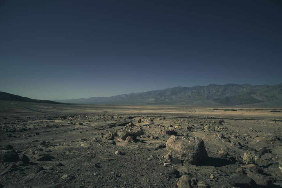 Free Image of Barren Landscape With Distant Mountains 