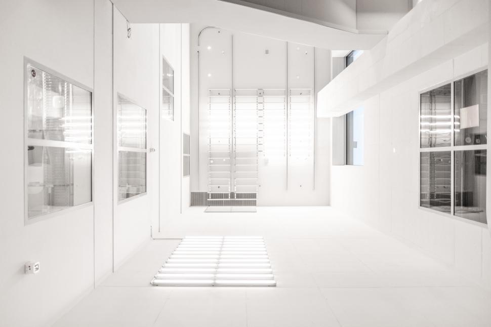 Free Image of Bright White Room With Numerous Windows 