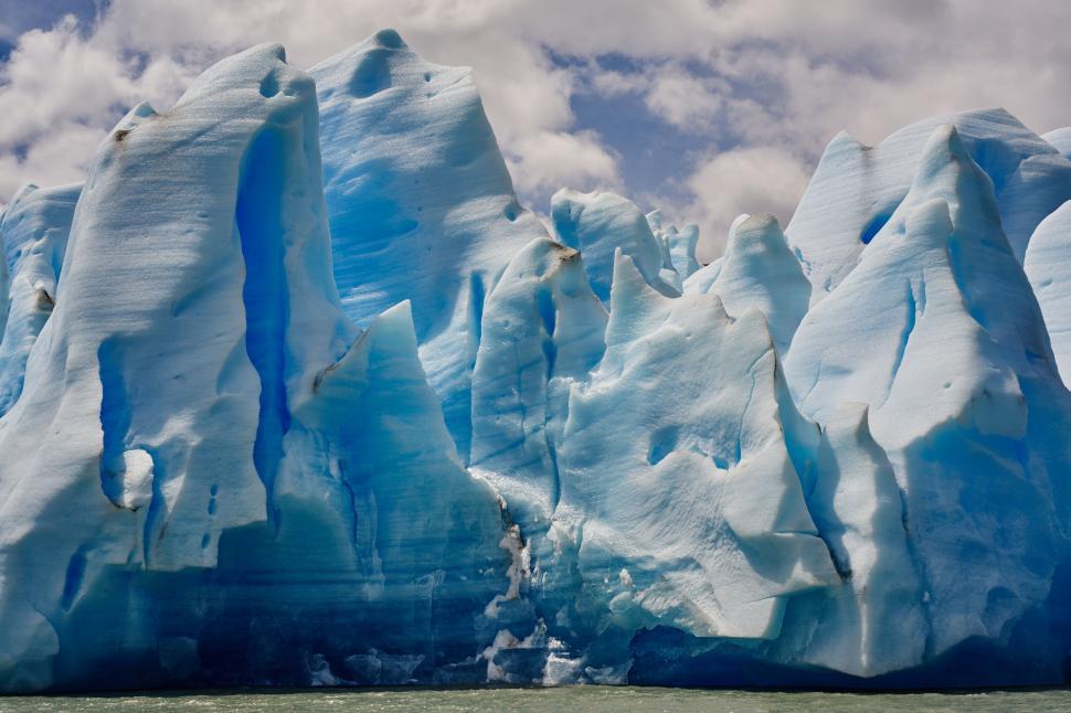 Free Image of Massive Iceberg Floating in Water 